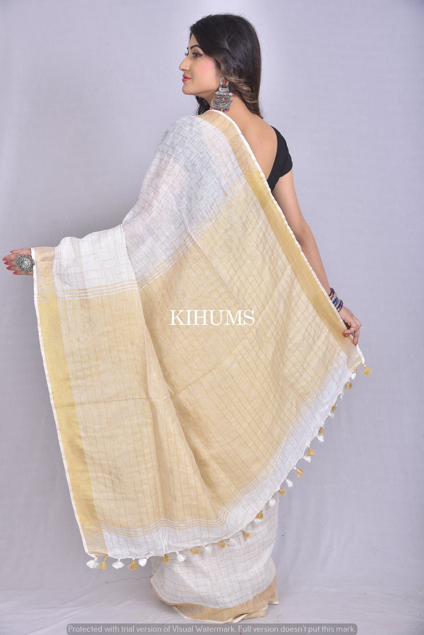 White handmade Linen Saree with Golden Zari Border