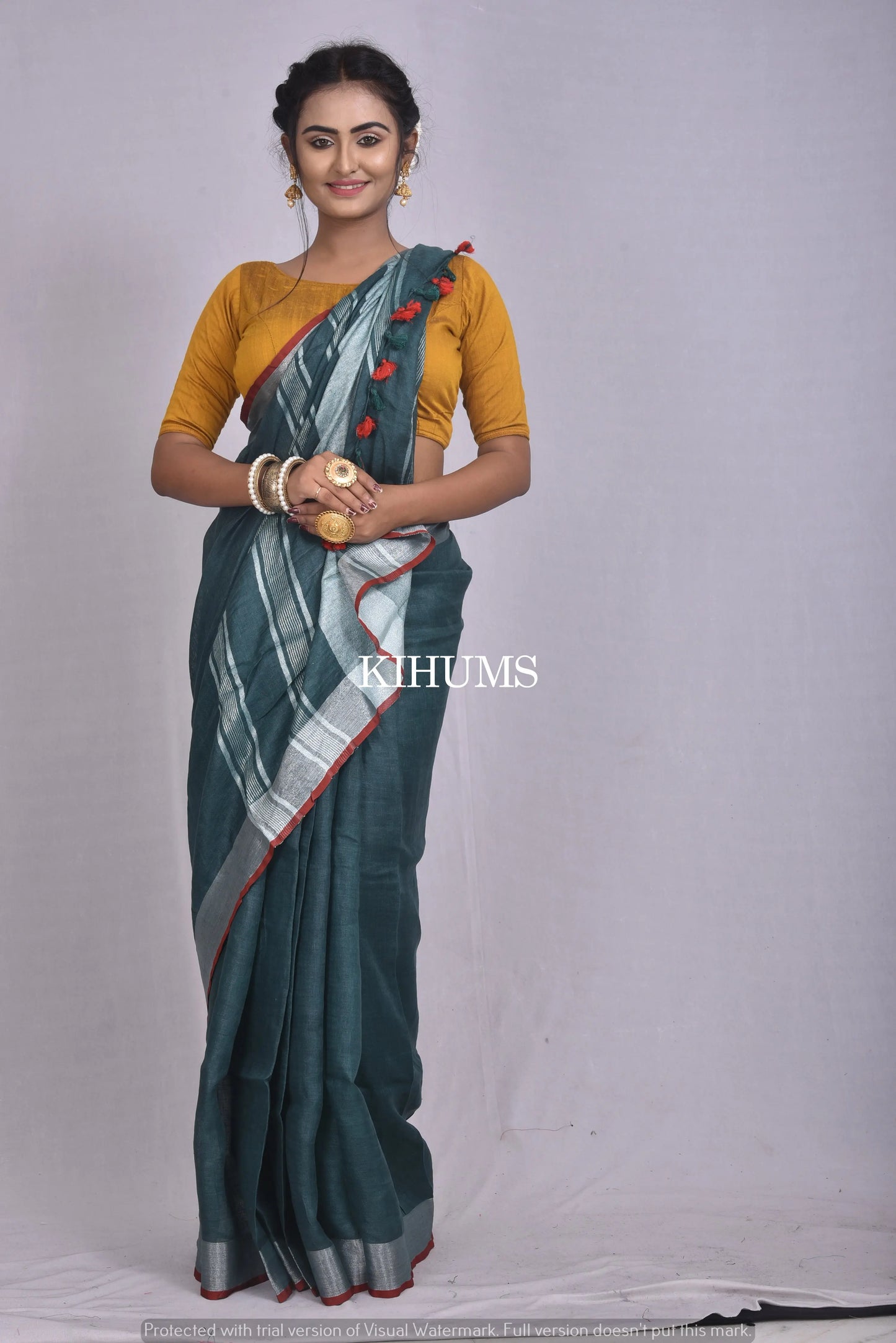 Dark Green Handwoven Linen Saree | Silver Zari Border | KIHUMS Saree kihums clothing