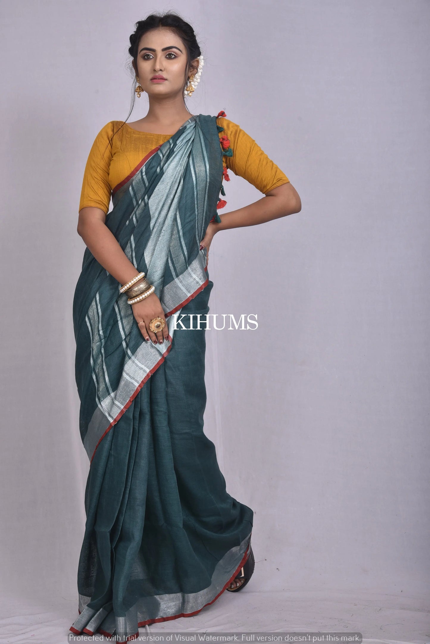 Dark Green Handwoven Linen Saree | Silver Zari Border | KIHUMS Saree kihums clothing