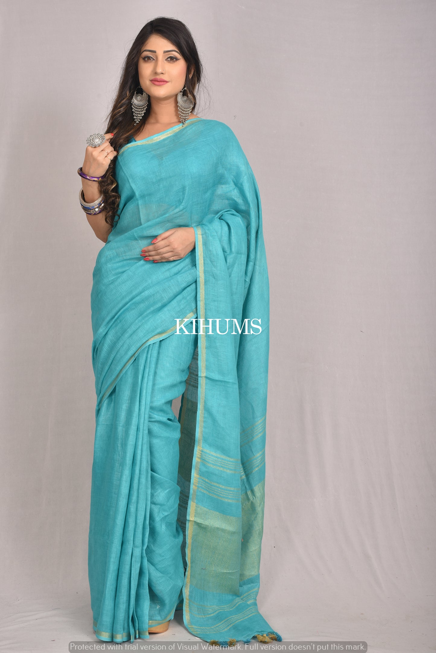 Turquoise Handwoven Linen Saree | Contrast border | KIHUMS Saree