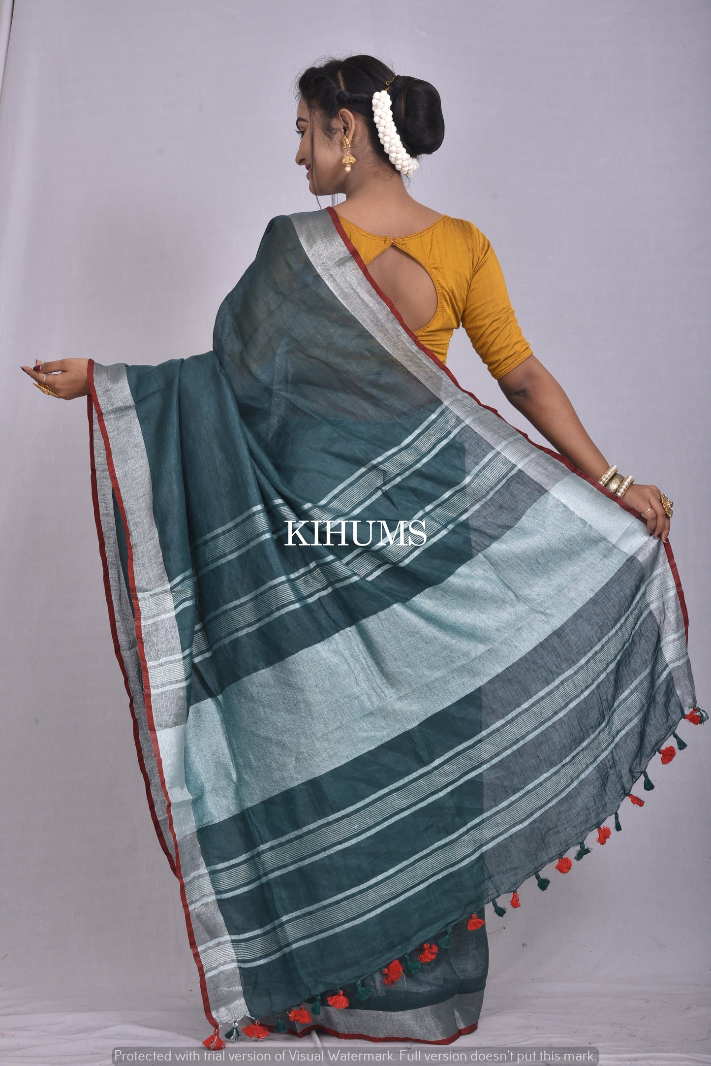 Dark Green Handwoven Linen Saree | Silver Zari Border | KIHUMS Saree